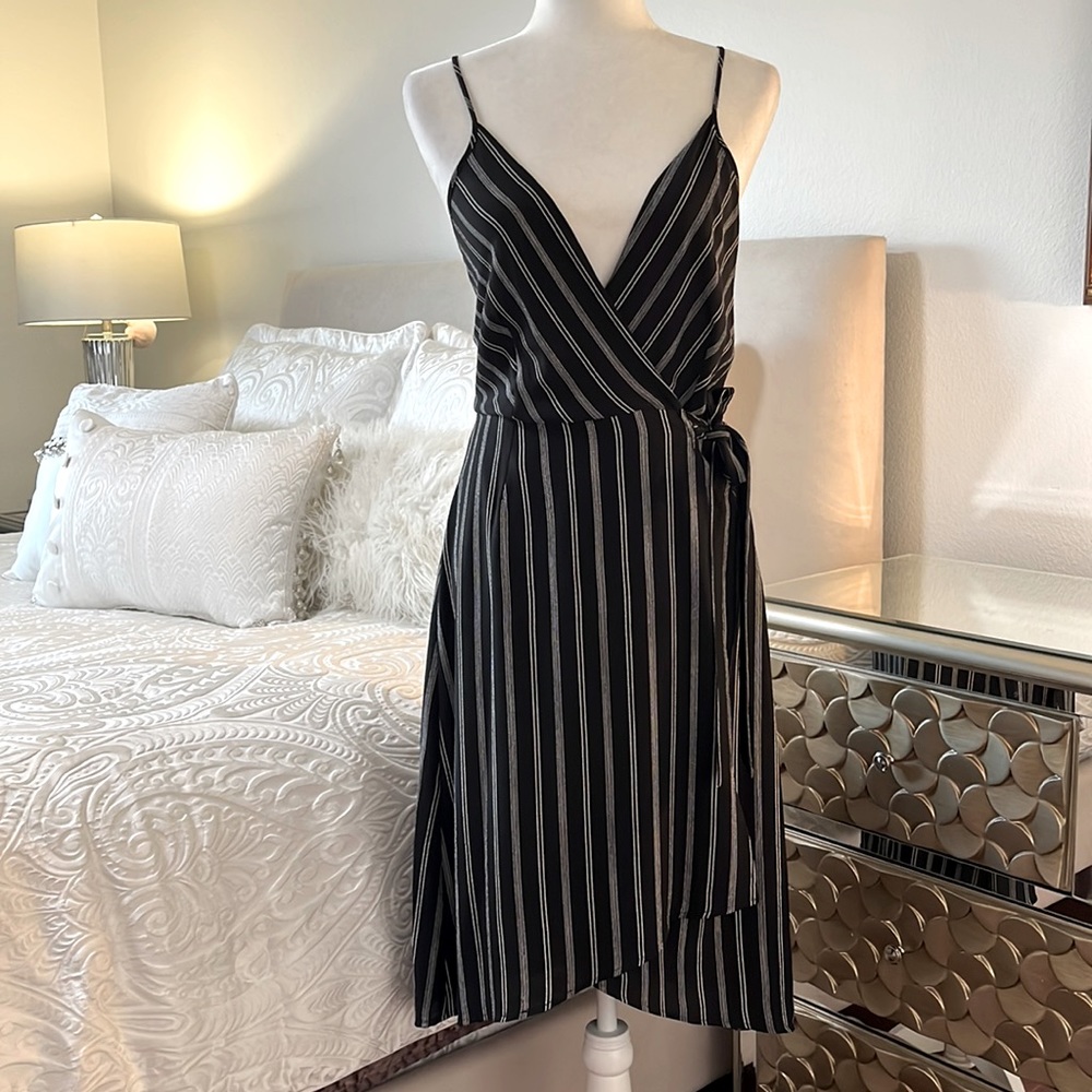 Monteau wrap dress. Black and white striped. Size Medium.